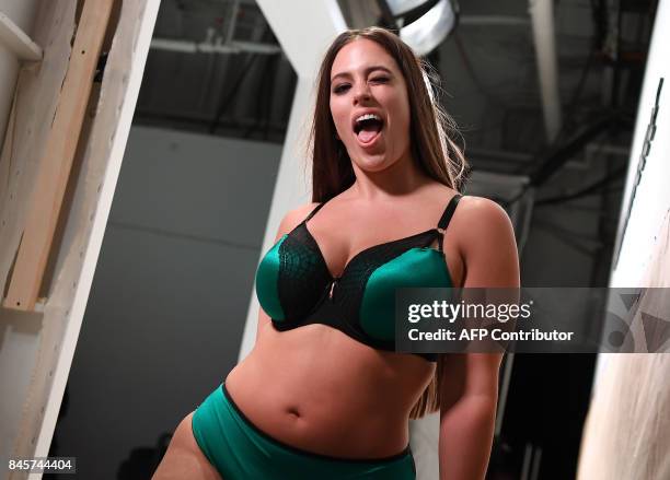 Model Ashley Graham poses backstage during the Addition Elle presentation on September 11, 2017 at the New York Fashion Week in New York City. Ashley...