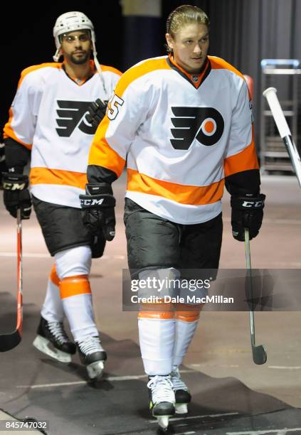 Ryan White of the Philadelphia Flyers walks to the ice before the game against the Edmonton Oilers at Rexall Place on March 21, 2015 in Edmonton,...