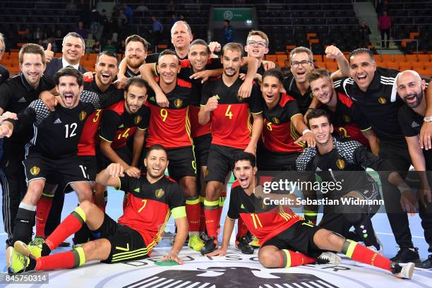 Players of Belgium celebrate winning the Futsal Four Nations Tournament at ratiopharm Arena on September 11, 2017 in Ulm, Germany.
