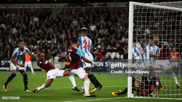 Andre Ayew of West Ham United scores their second goal during the Premier League match between West Ham United and Huddersfield Town at London...