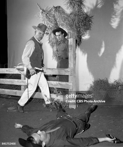 Television dramatic anthology series, Climax!, episode The Mojave Kid. Pictured standing from left is Ward Bond and Ricardo Montalban . January 10,...