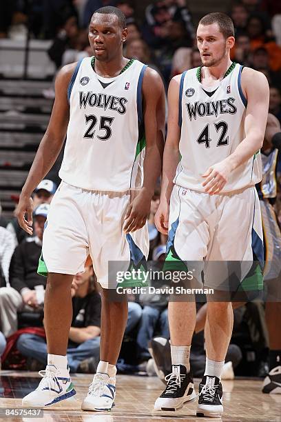 Al Jefferson and Kevin Love of the Minnesota Timberwolves walk down the court during the game against the Memphis Grizzlies on December 29, 2008 at...