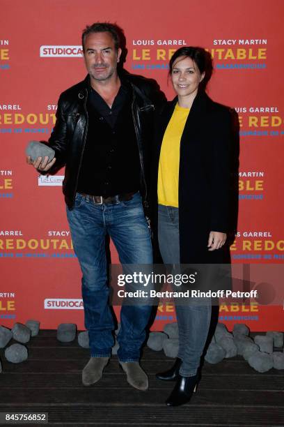 Actor Jean Dujardin and Nathalie Pechalat attend the "Le Redoutable" Paris Premiere at Cinema du Pantheon on September 11, 2017 in Paris, France.