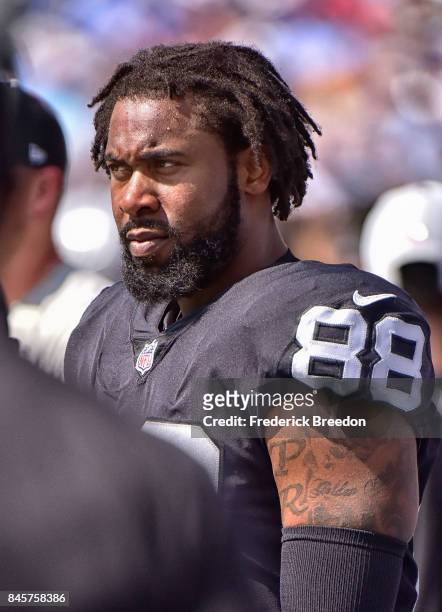 Clive Walford of the Oakland Raiders watches from the sideline during a game against the Tennessee Titans at Nissan Stadium on September 10, 2017 in...
