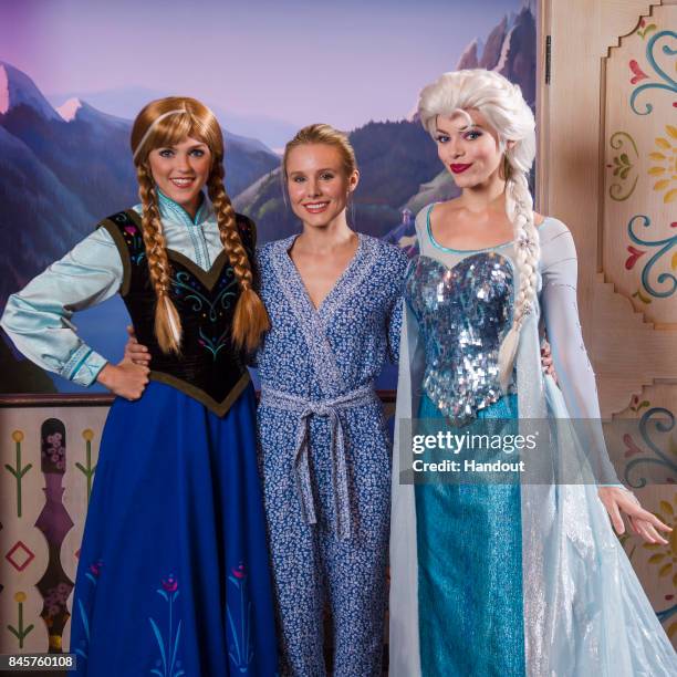 In this handout photo provided by Disney Parks, Actress Kristen Bell visits Anna and Elsa of Disney's "Frozen," Thursday, September 7 in the Norway...
