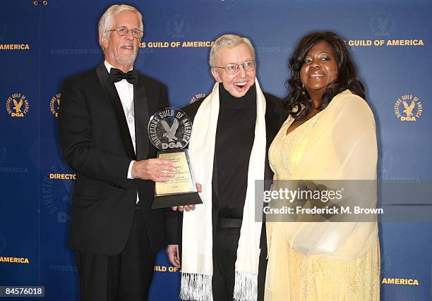 President Michael Apted, film critic Roger Ebert, and his wife Judge Chaz Hammelsmith pose in the press room with Roger's Honorary Life Membership...