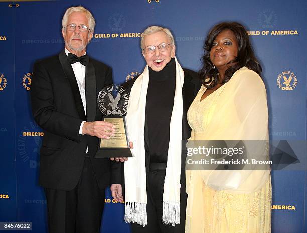 President Michael Apted, film critic Roger Ebert, and his wife Judge Chaz Hammelsmith pose in the press room with Roger's Honorary Life Membership...