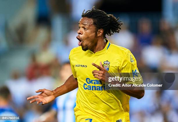 Logic Remy of Union Deportiva Las Palmas celebrates after scoring with during the La Liga match between Malaga and Las Palmas at Estadio La Rosaleda...