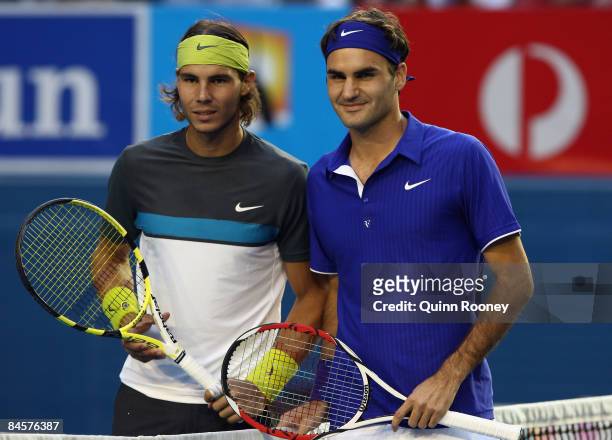 Rafael Nadal of Spain and Roger Federer of Switzerland pose for photographers before their men's final match during day fourteen of the 2009...