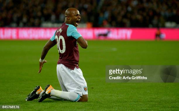 Andre Ayew of West Ham United celebrates his goal during the Premier League match between West Ham United and Huddersfield Town at London Stadium on...