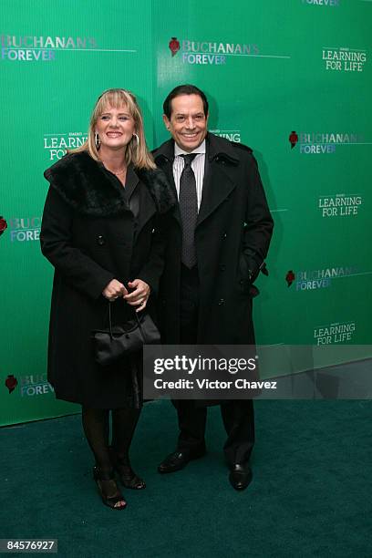 Personality Juan Jose Origel and guest attend the Buchanan's Forever Night Education Benefit Concert at Colegio de las Vizcainas on January 31, 2009...