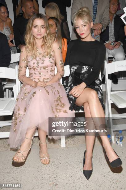 Ana de Armas and Pom Klementieff attend Oscar De La Renta fashion show during New York Fashion Week on September 11, 2017 in New York City.