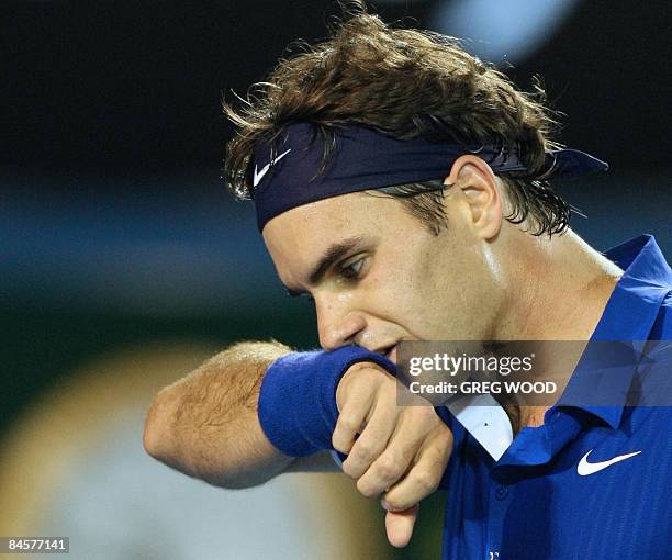 Roger Federer of Switzerland gestures during his men's singles final against Rafael Nadal of Spain at the Australian Open tennis tournament in...