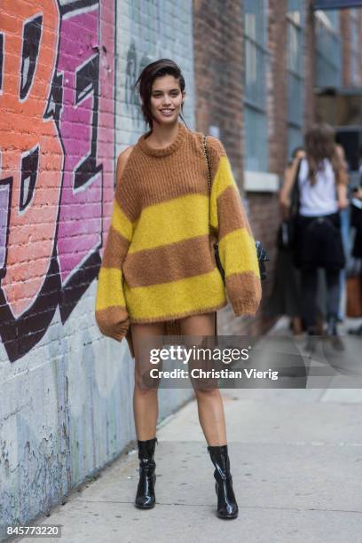 Sara Sampaio wearing a striped oversized knit seen in the streets of Manhattan outside Zadig & Voltaire during New York Fashion Week on September 11,...