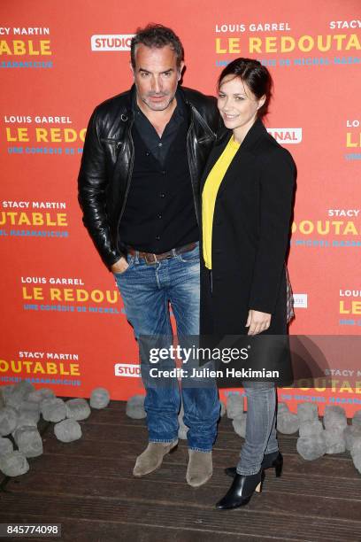 Actor Jean Dujardin and Nathalie Pechalat attend "Le Redoutable" Paris Premiere at Cinema du Pantheon on September 11, 2017 in Paris, France.