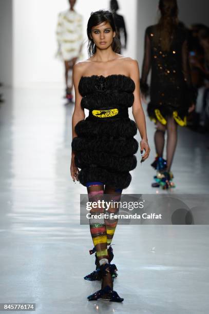 Model walks the runway for Libertine fashion show during New York Fashion Week: The Shows at Gallery 3, Skylight Clarkson Sq on September 11, 2017 in...