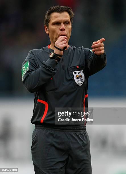 Referee Michael Weiner gestures during the Second Bundesliga match between FC Hansa Rostock and MSV Duisburg at the DKB Arena on February 1, 2009 in...