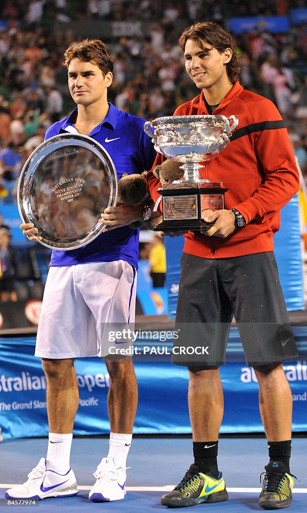 Rafael Nadal of Spain (R) poses with the