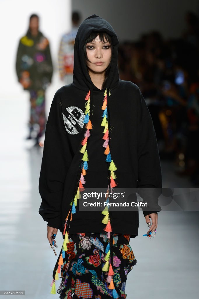 A model walks the runway for Libertine fashion show during New York ...