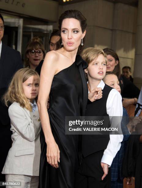 Vivienne Marcheline Jolie-Pitt, Angelina Jolie, Shiloh Nouvel Jolie-Pitt and Knox Leon Jolie-Pitt attend the premiere of 'First they Killed my...