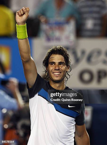 Rafael Nadal of Spain celebrates after winning championship point in his men's final match against Roger Federer of Switzerland during day fourteen...