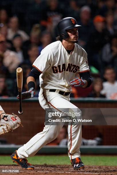 Jarrett Parker of the San Francisco Giants hits an RBI double against the Oakland Athletics during the fifth inning at AT&T Park on August 3, 2017 in...