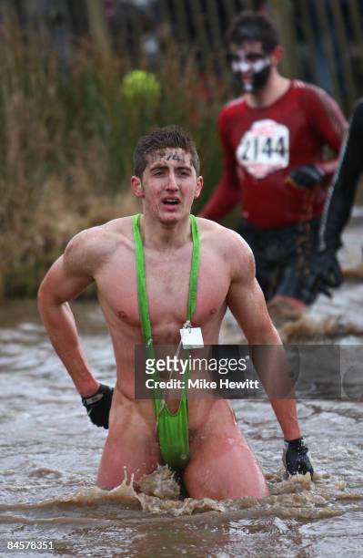 Competitor in a "mankini" braves a temperature of 1C during the Tough Guy Challenge at South Perton Farm on February 1, 2009 in Wolverhampton,...