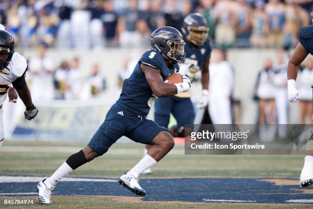 Akron Zips wide receiver Tra'Von Chapman runs after making a catch during the first quarter of the college football game between the Arkansas-Pine...