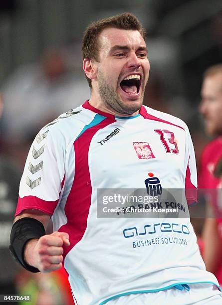Bartosz Jurecki of Poland celebrates a goal during the Men's World Handball Championships third place playoff match between Denmark and Poland at the...