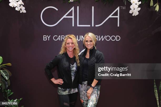 Lead designer, Carrie Underwood and her road trainer, Eve Overland lead a group workout to celebrate the lines Fall/Winter 17 collection at West...