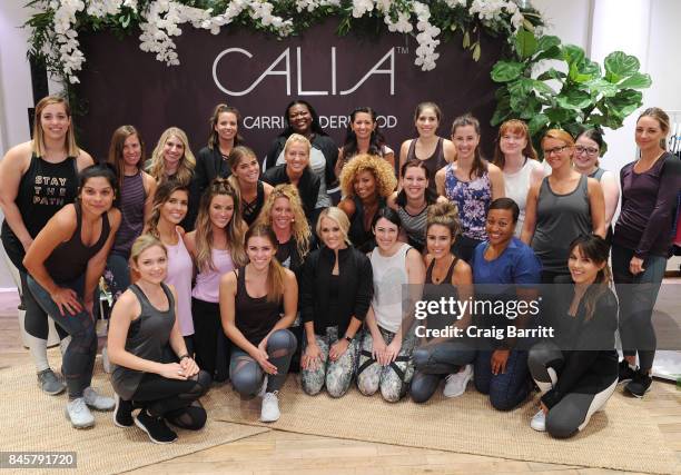 Lead designer, Carrie Underwood and her road trainer, Eve Overland lead a group workout to celebrate the lines Fall/Winter 17 collection at West...