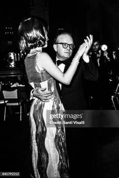 Lee Radziwill dancing with Truman Capote at Truman Capote BW Ball on November 28, 1966 in New York, New York.