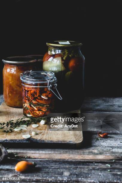 fermented preserved vegetables food concept - sliced pickles stockfoto's en -beelden