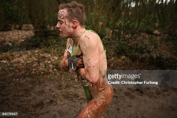 Competitor wearing a 'mankini' braves the cold while running during the Tough Guy Challenge 2009 at South Perton Farm on February 1, 2009 in...