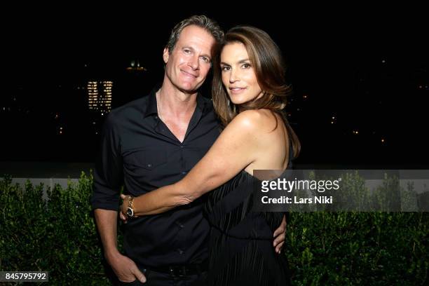 Founder, Gerber Group Rande Gerber and model Cindy Crawford attends the fashion week celebration with DuJour Magazine hosted by Cindy Crawford and...