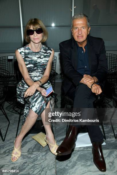 Anna Wintour and Mario Testino attend Oscar De La Renta fashion show during New York Fashion Week on September 11, 2017 in New York City.