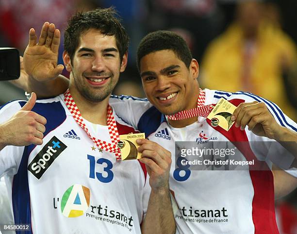 Nikola Karabatic of France and Daniel Narcisse show their gold medal after winning the Men's World Handball Championships final match between France...