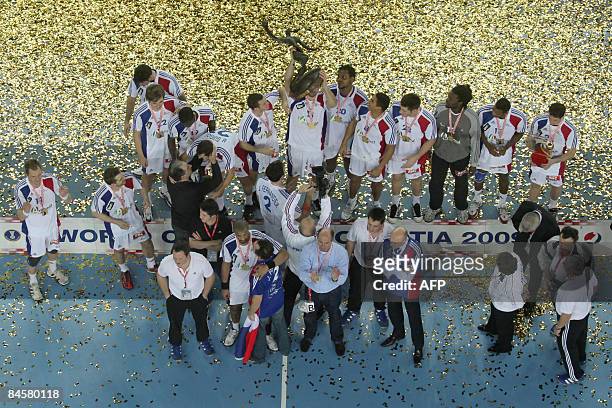 Olympic Champion French handball team celebrates their victory on Croatia 24-19 at the end of their men's World Championships final match at the...