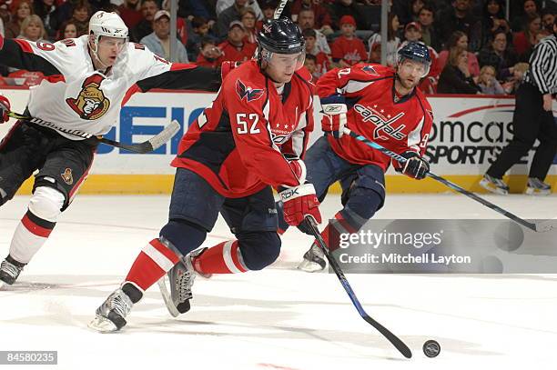 Mike Green of the Washington Capitals skates with the puck during a NHL hockey game against the Ottawa Senators on February 1, 2009 at the Verizon...