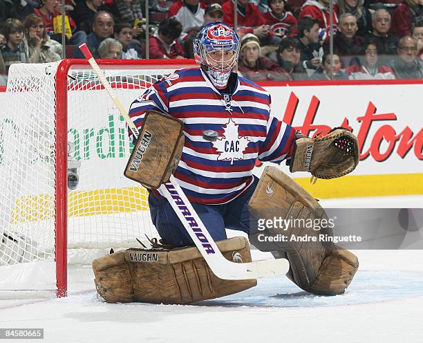 Carey Price of the Montreal Canadiens makes a blocker save against the Boston Bruins at the Bell Centre on February 1, 2009 in Montreal, Quebec,...