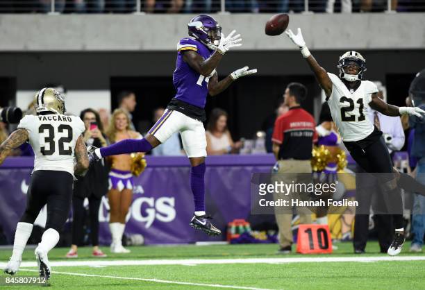 Stefon Diggs of the Minnesota Vikings makes a contested catch late in the first half of the game against the New Orleans Saints on September 11, 2017...