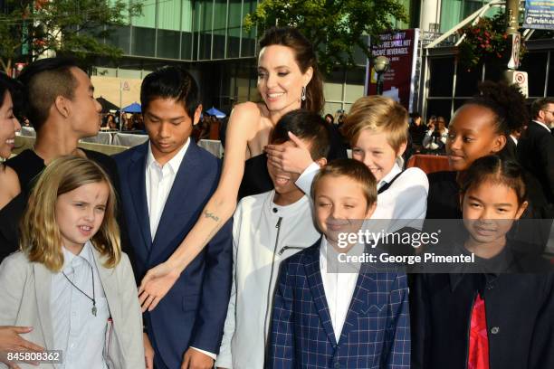 Vivienne Jolie-Pitt, Maddox Jolie-Pitt, Pax Jolie-Pitt, Kimhak Mun, Knox Jolie-Pitt, Shiloh Jolie-Pitt, Angelina Jolie, Zahara Jolie-Pitt and Sareum...