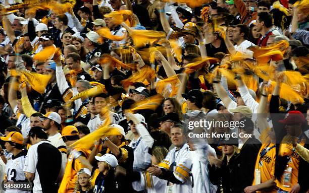 Fans of the Pittsburgh Steelers wave terrible towels against the Arizona Cardinals during Super Bowl XLIII on February 1, 2009 at Raymond James...