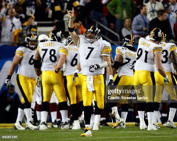 Quarterback Ben Roethlisberger of the Pittsburgh Steelers celebrates after Gary Russell scored a 1-yard rushing touchdown in the second quarter...