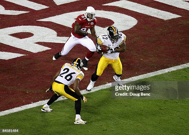 James Harrison of the Pittsburgh Steelers makes an interception in the Cardinals endzone in the second quarter against the Arizona Cardinals during...