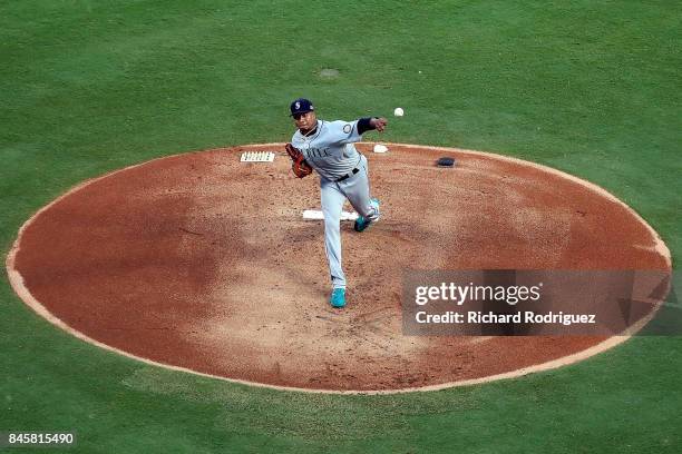 Ariel Miranda of the Seattle Mariners pitches in the first inning of a game against the Texas Rangers at Globe Life Park in Arlington on September...