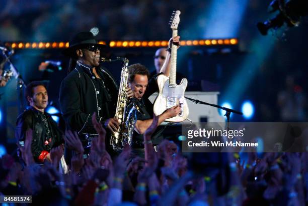 Musicians Clarence Clemons and Bruce Springsteen of the E Street Band perform at the Bridgestone halftime show during Super Bowl XLIII between the...