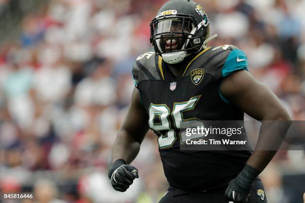 Abry Jones of the Jacksonville Jaguars celebrates after a tackle in the first half against the Houston Texans at NRG Stadium on September 10, 2017 in...