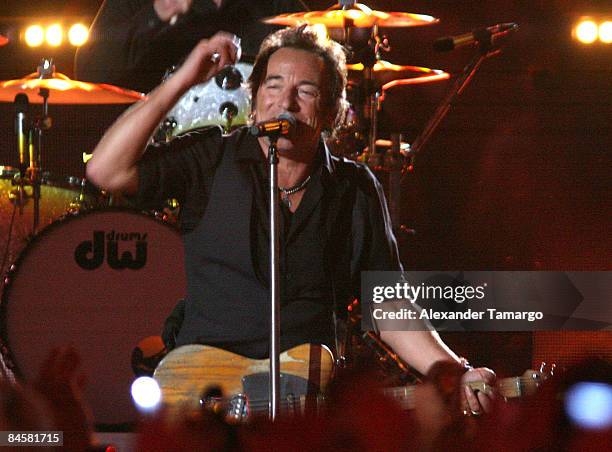 Musician Bruce Springsteen and the E Street Band perform at the Bridgestone halftime show during Super Bowl XLIII between the Arizona Cardinals and...