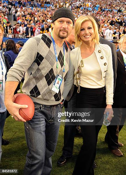 Musician Tim McGraw and singer Faith Hill attend Super Bowl XLIII between the Arizona Cardinals and the Pittsburgh Steelers on February 1, 2009 at...